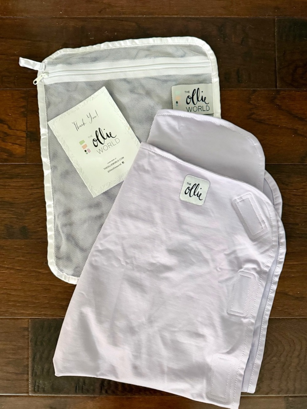 The Ollie Swaddle sleep sack in Lavender *Gently used*